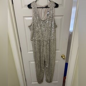 Express women’s Silver Size XL Sequin Jumpsuit NEW with tags